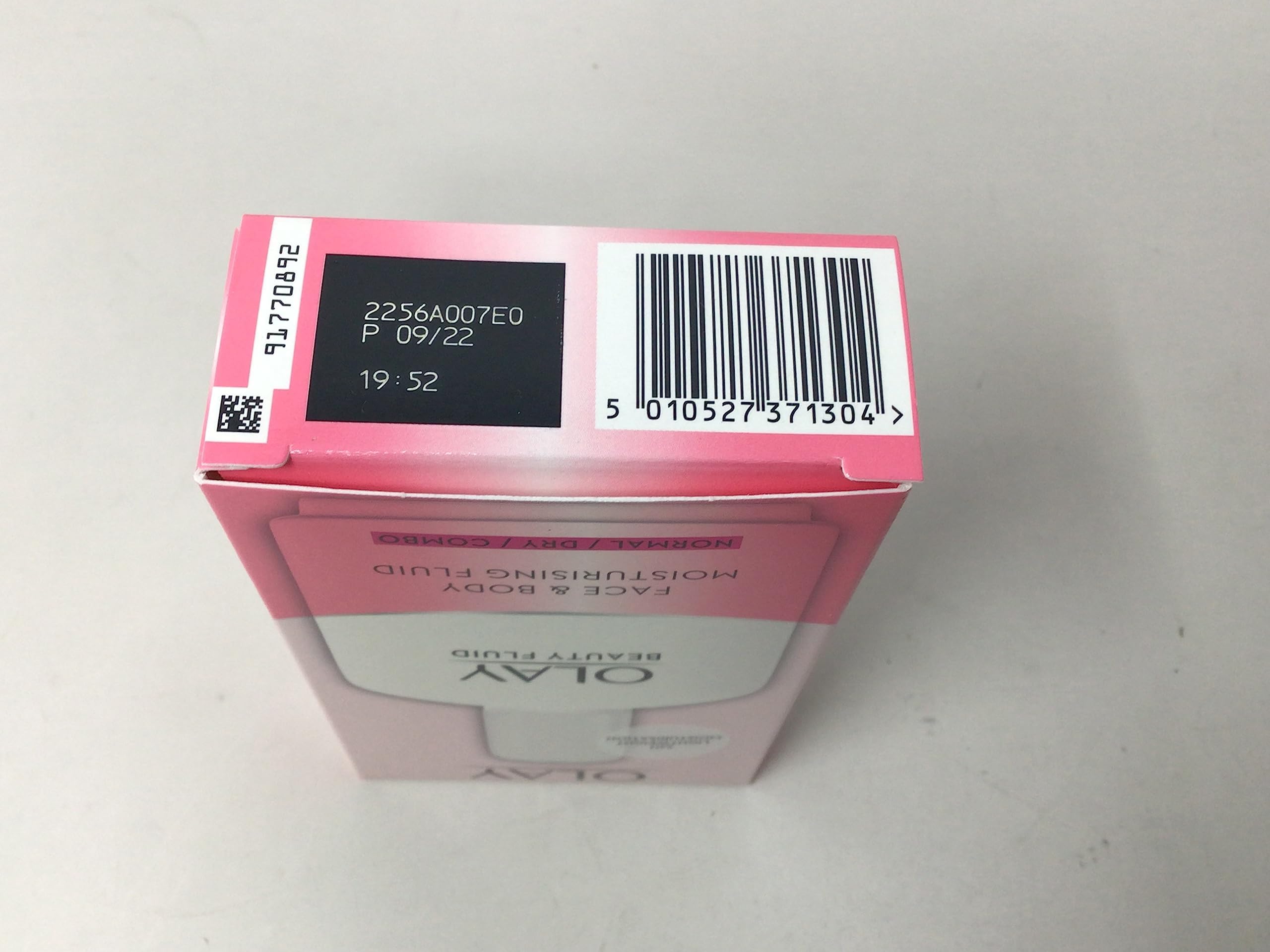 Olay Beauty Fluid Regular 100 ml, textura no grasa para piel cómoda.