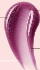 Ole Henriksen Pout Preserve brillo labial Lingonberry, realza la textura y aspecto jugoso.