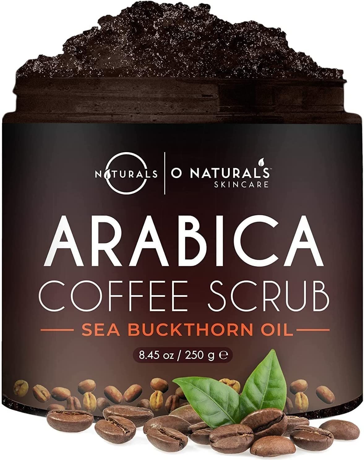 O Naturals exfoliante corporal con sal del Mar Muerto y cafe Arabica para piel suave.