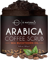 O Naturals exfoliante corporal con sal del Mar Muerto y cafe Arabica para piel suave.
