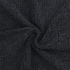 Toalla Orighty microfibra negra, tacto suave y alta absorbencia para cabello.