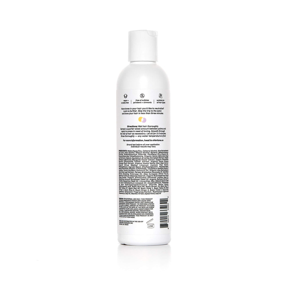 Textura crema morada del acondicionador para cabello suave e hidratado.
