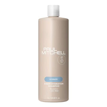 Paul Mitchell Champú Hidratación Pura: botella que sugiere hidratación para cabello seco