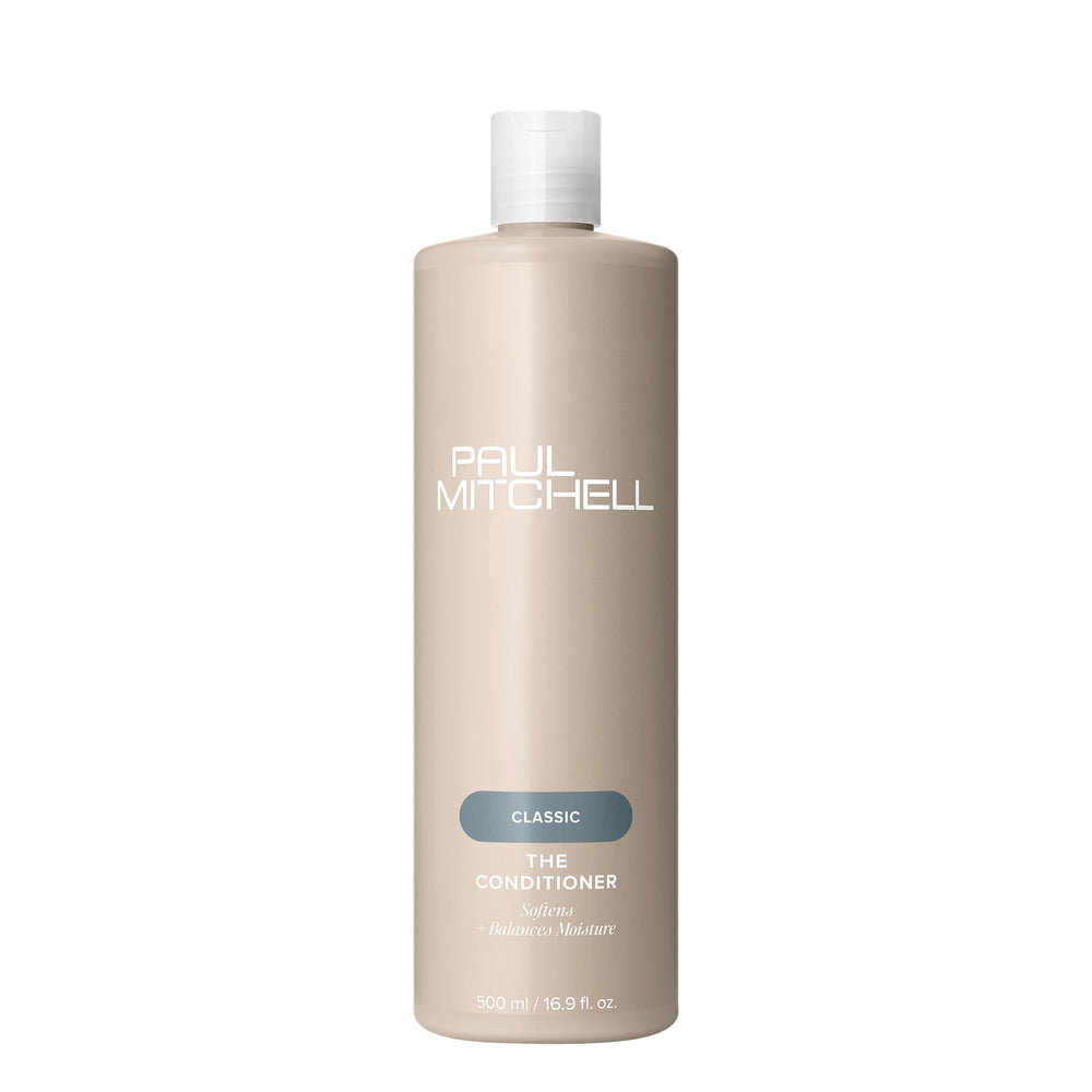 El Acondicionador Paul Mitchell frente a la botella, hidratación suave para todo tipo de cabello