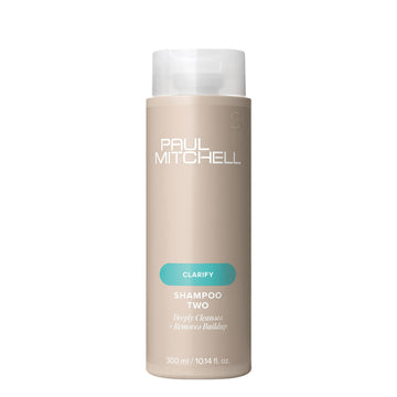 Shampoo Two de Paul Mitchell en botella, limpieza profunda que deja el cabello con brillo.