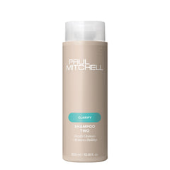 Shampoo Two de Paul Mitchell en botella, limpieza profunda que deja el cabello con brillo.