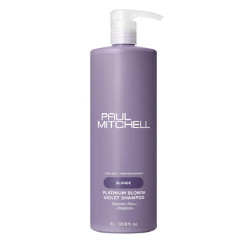 Shampoo violeta Paul Mitchell Rubio Platino en botella, neutraliza tonos amarillentos.