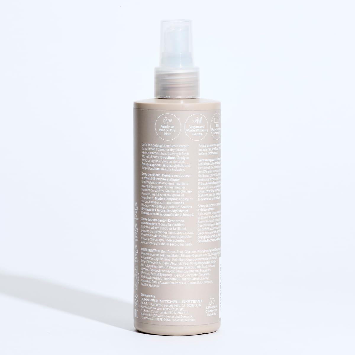 Paul Mitchell Taming Spray envase PCR para uso responsable.