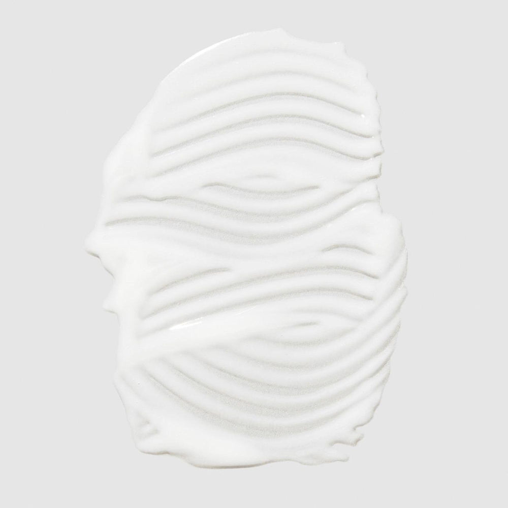 Paul Mitchell The Cream – application avant séchage pour cheveux hydratés et volumisés.