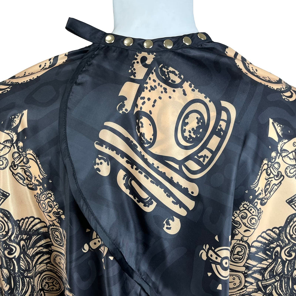 Pelocapa para peluquería impermeable protege la ropa durante tintes.