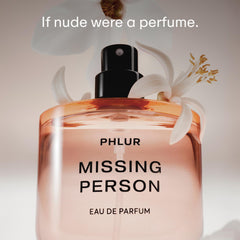 PHLUR Missing Person bottle in clear glass packaging for premium visual appeal.