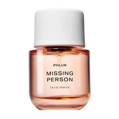 PHLUR Missing Person bottle with magnetic ceramic lid, elegant display for gifting.