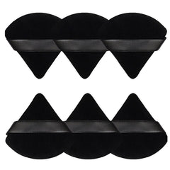 Esponja Pimoys con forma triangular y circular para difuminar la base con precisión.