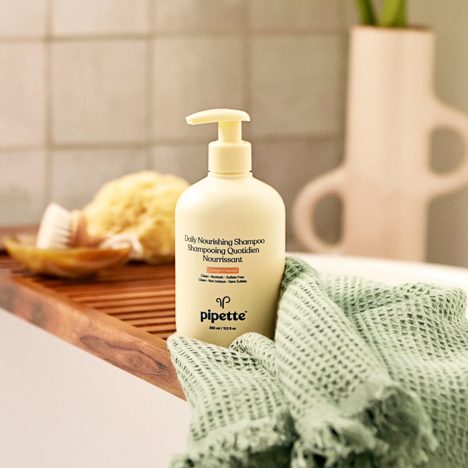 Pipette daily nourishing conditioner bottle detangles and leaves hair soft.