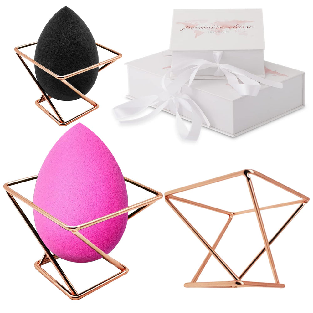 Soporte de esponja de maquillaje de Première Classe Skincare en rosa dorado para secado rápido.