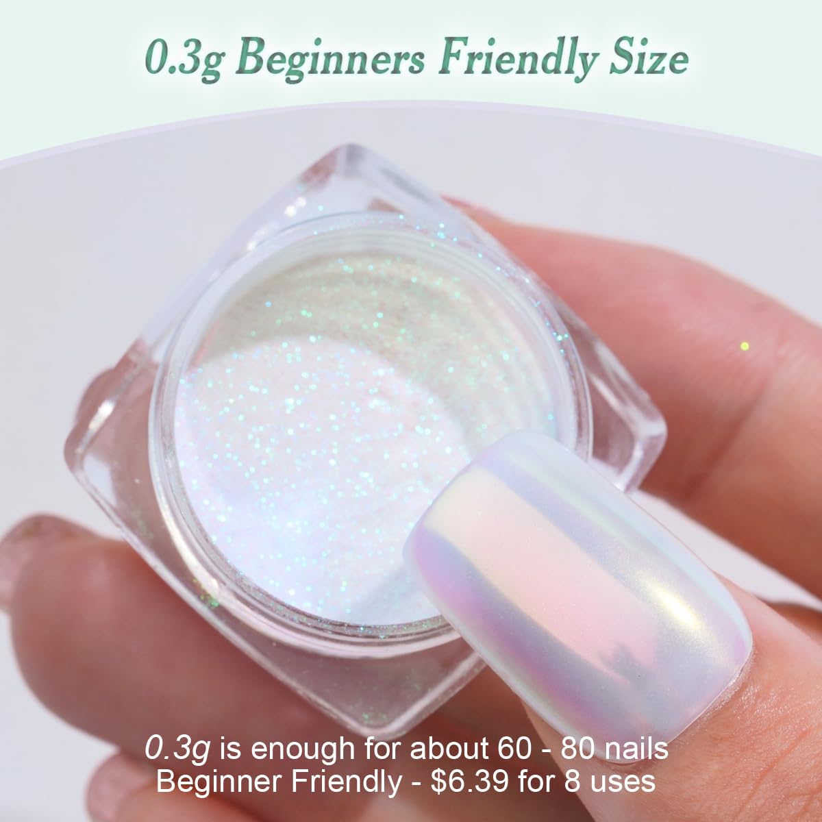 Aplicación rápida con polvo aurora iridiscente PrettyDiva para acabado luminoso en uñas.