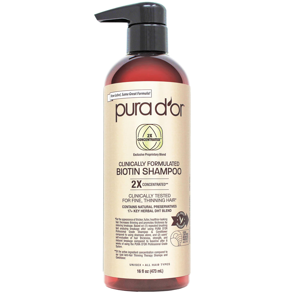 PURA D'OR Biotin Shampoo bottle showing premium formula for fuller-looking hair, suitable for daily scalp care.