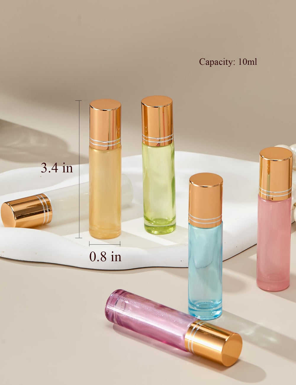 Qeuly aplicador-rodillo 10 ml en botella de vidrio verde, práctico para aceites esenciales diluidos.