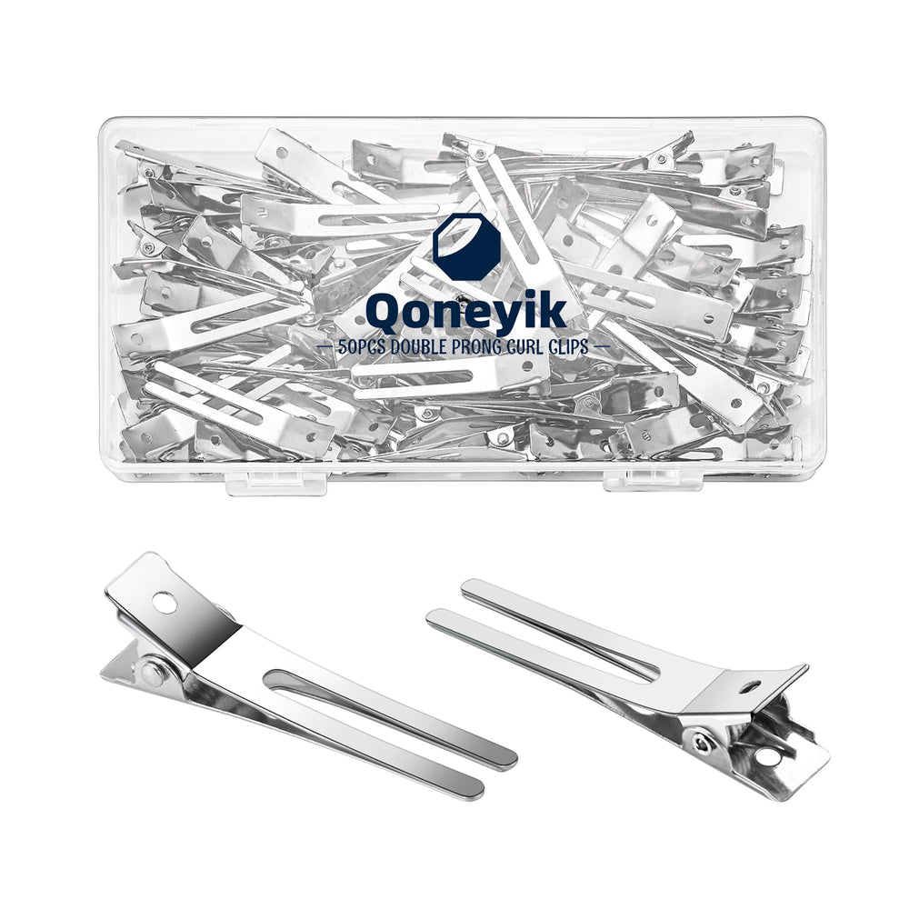 Clip Qoneyik con dos dientes para rizos, acabado plateado y sujeción suave.