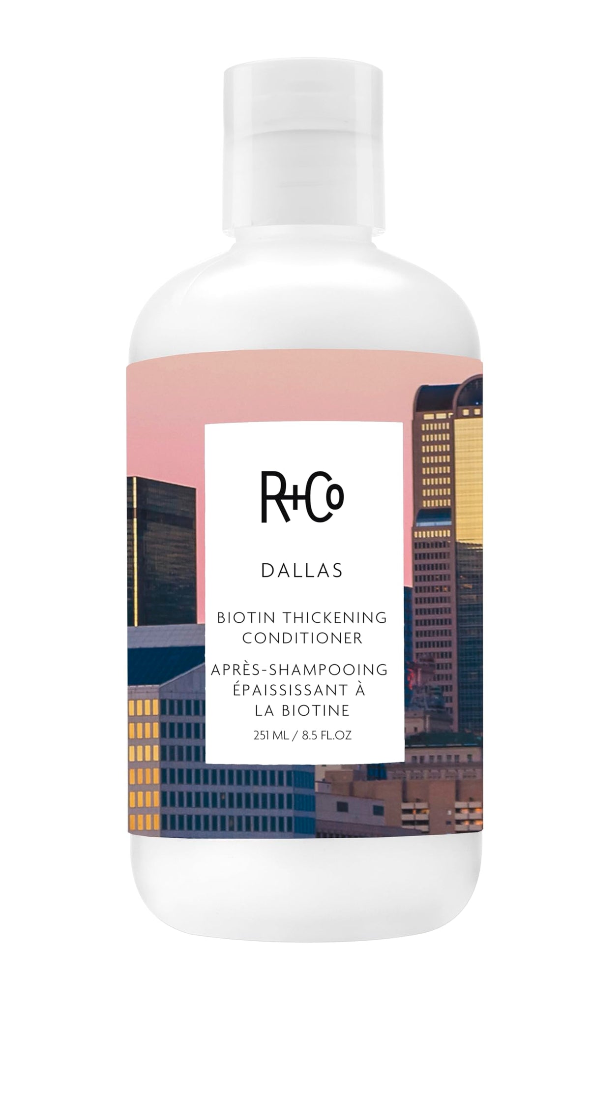 Acondicionador engrosador con biotina de R+Co Dallas, botella visible y cuerpo ligero