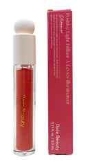 Rare Beauty brillo labial iluminante, destellos rosados y champán para un acabado radiante.