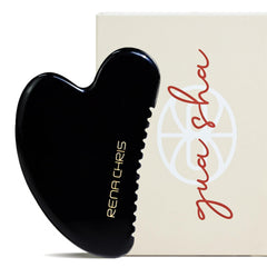 Rena Chris gua sha obsidiana frente para mejorar la relajación facial y circulación.