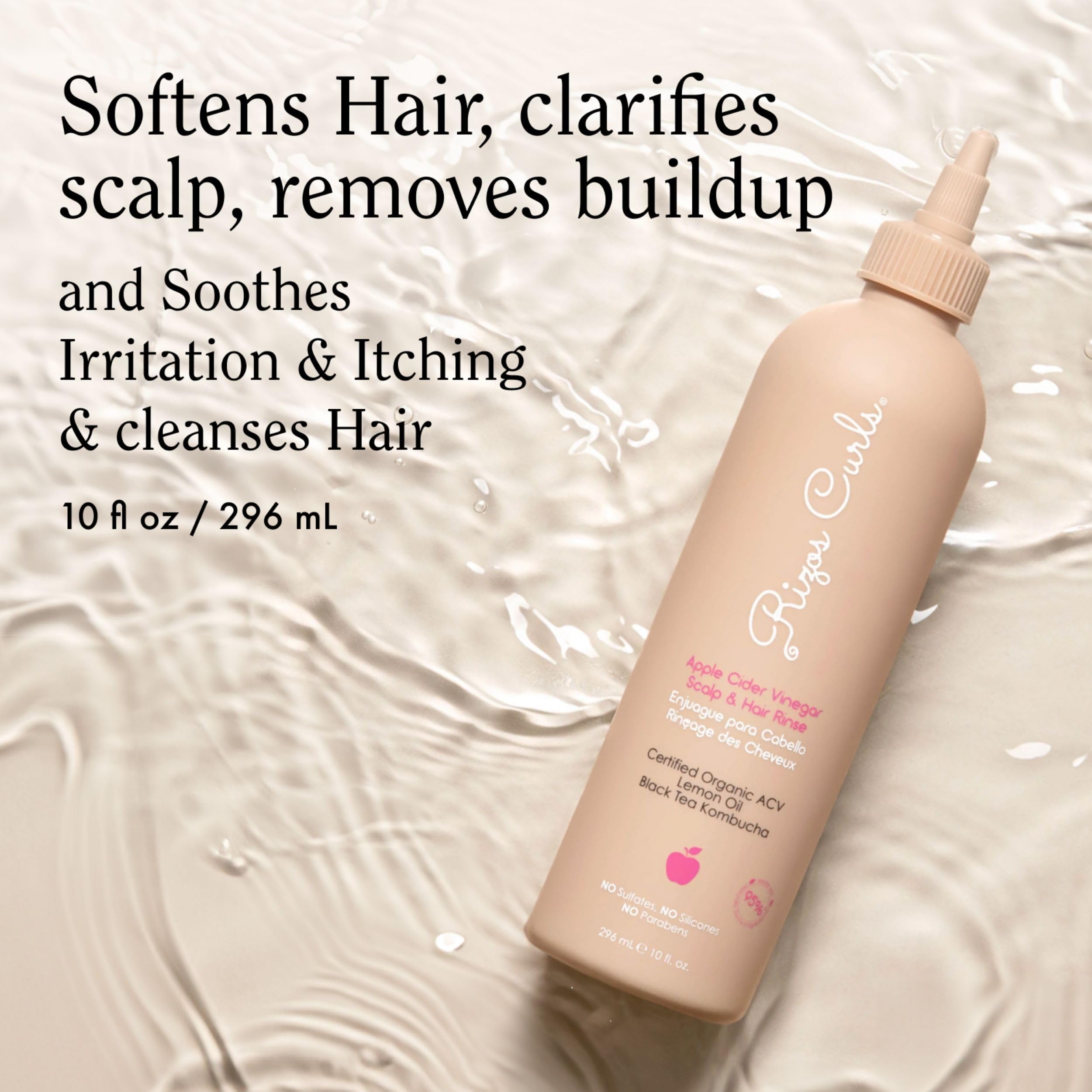 Rizos Curls botella de enjuague para cabello suave y brillo natural.