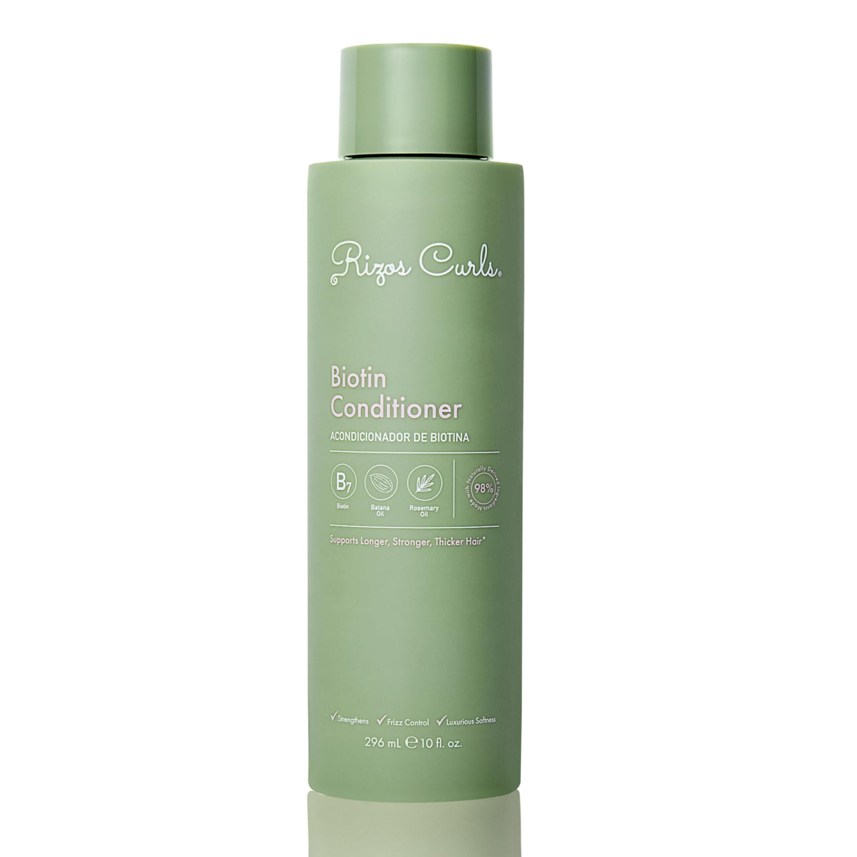 Rizos Curls Biotin Conditioner botella vertiendo, hidratación para todo tipo de cabello.