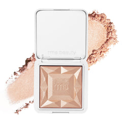 RMS Beauty Hydra Dew Luminizer, compacto con espejo, ideal para retoques y acabado luminoso.