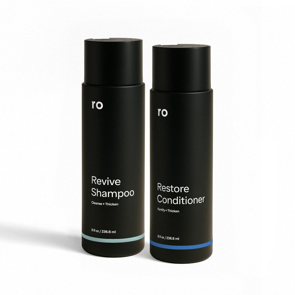Ro Revive champú botella visible con aroma mentolado, sensación fresca para el cuero cabelludo