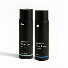 Ro Revive champú botella visible con aroma mentolado, sensación fresca para el cuero cabelludo