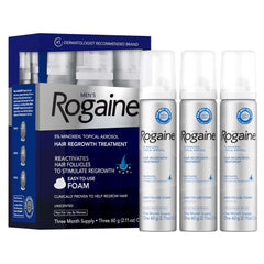 Rogaine espuma Minoxidil 5% para estimular crecimiento capilar en la coronilla.