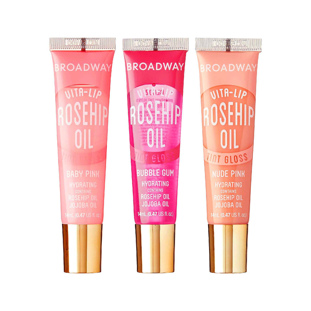 Labial Ruby Kisses Broadway Vita-Lip en tono rosa bebé, brillo duradero y hidratación ligera.