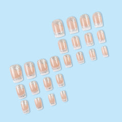 RUOKEXIN uñas postizas con brillos plateados para un toque glamuroso.