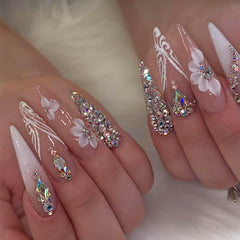 Uñas RUOKEXIN estileto con cristales para un look glamoroso y duradero.