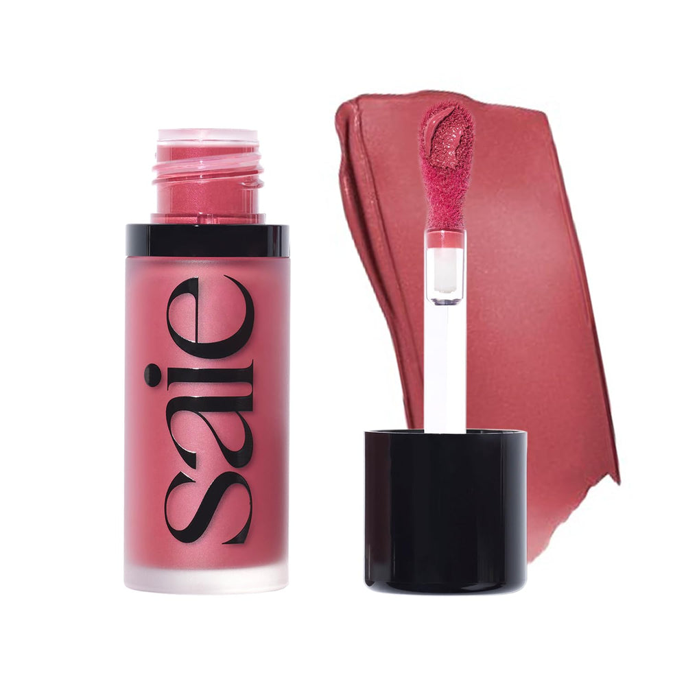 Saie Dew Liquid Blush montre le flacon et l'applicateur facilitant une application précise.