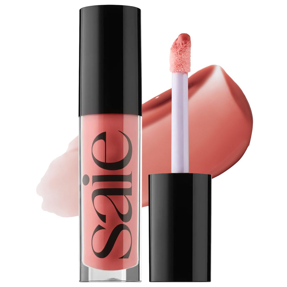 Saie GlossyBounce bottle close-up showing radiant, hydrating shine on lips.
