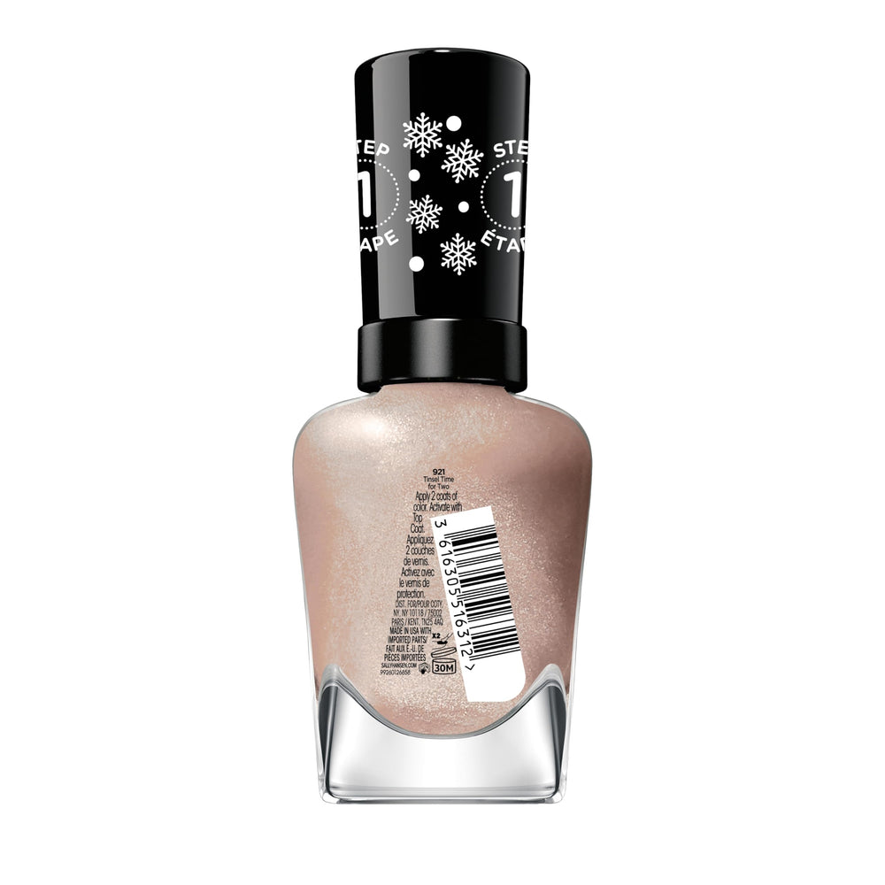 Esmalte sin lámpara ultravioleta en tono nude con brillo festivo