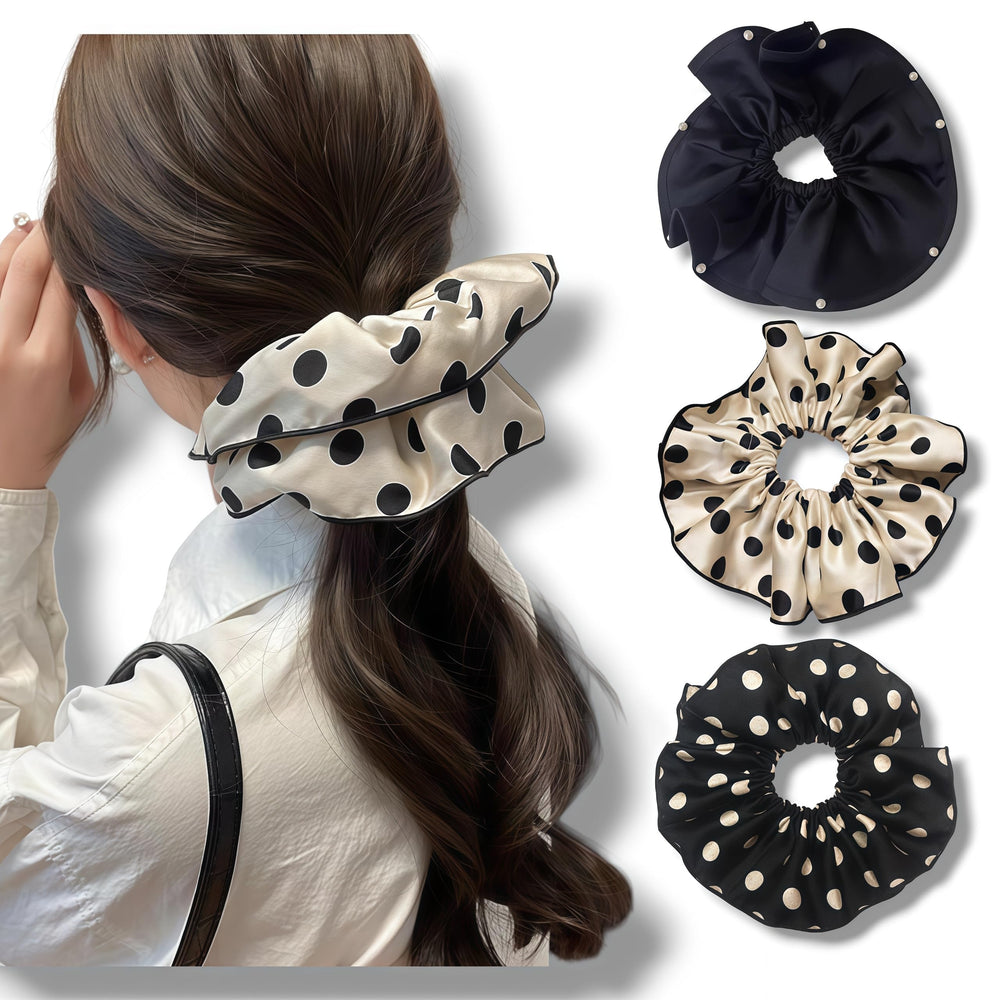 Scrunchies satinados negros con perlas en el borde, apariencia sofisticada para eventos.