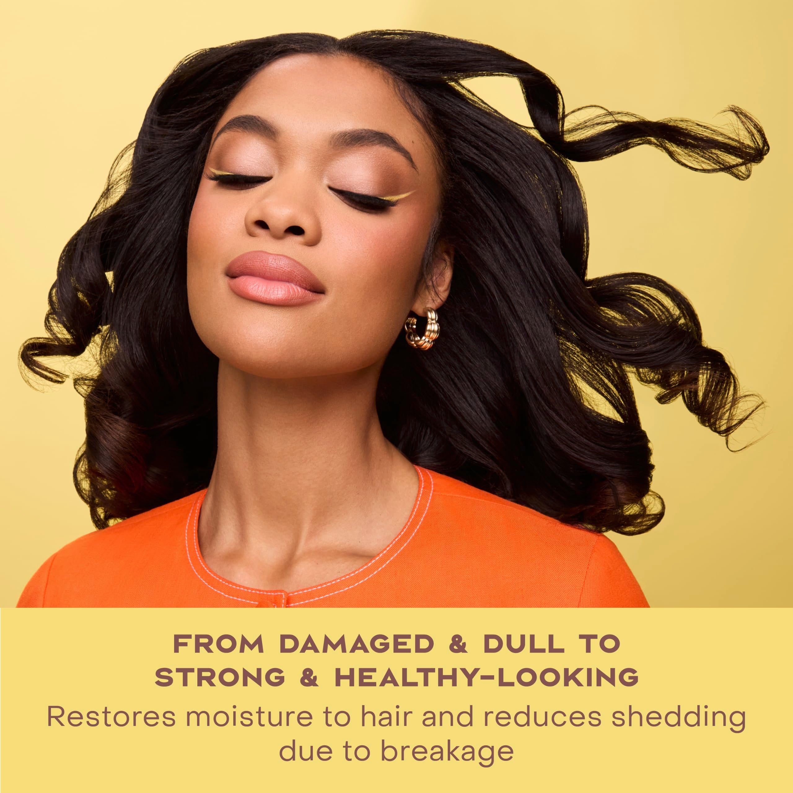 Curl definition after use visible in glossy hair closeup