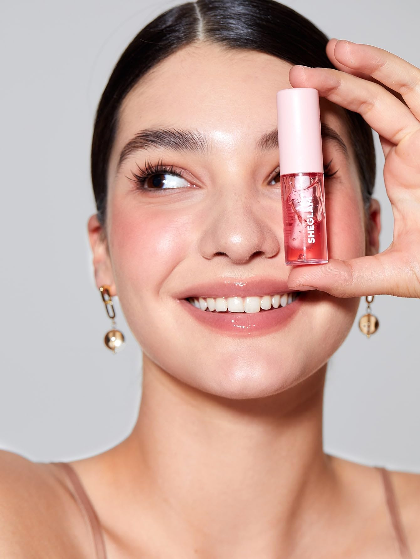 SHEGLAM Jelly Wow Aceite labial sin sensación pegajosa en labios.