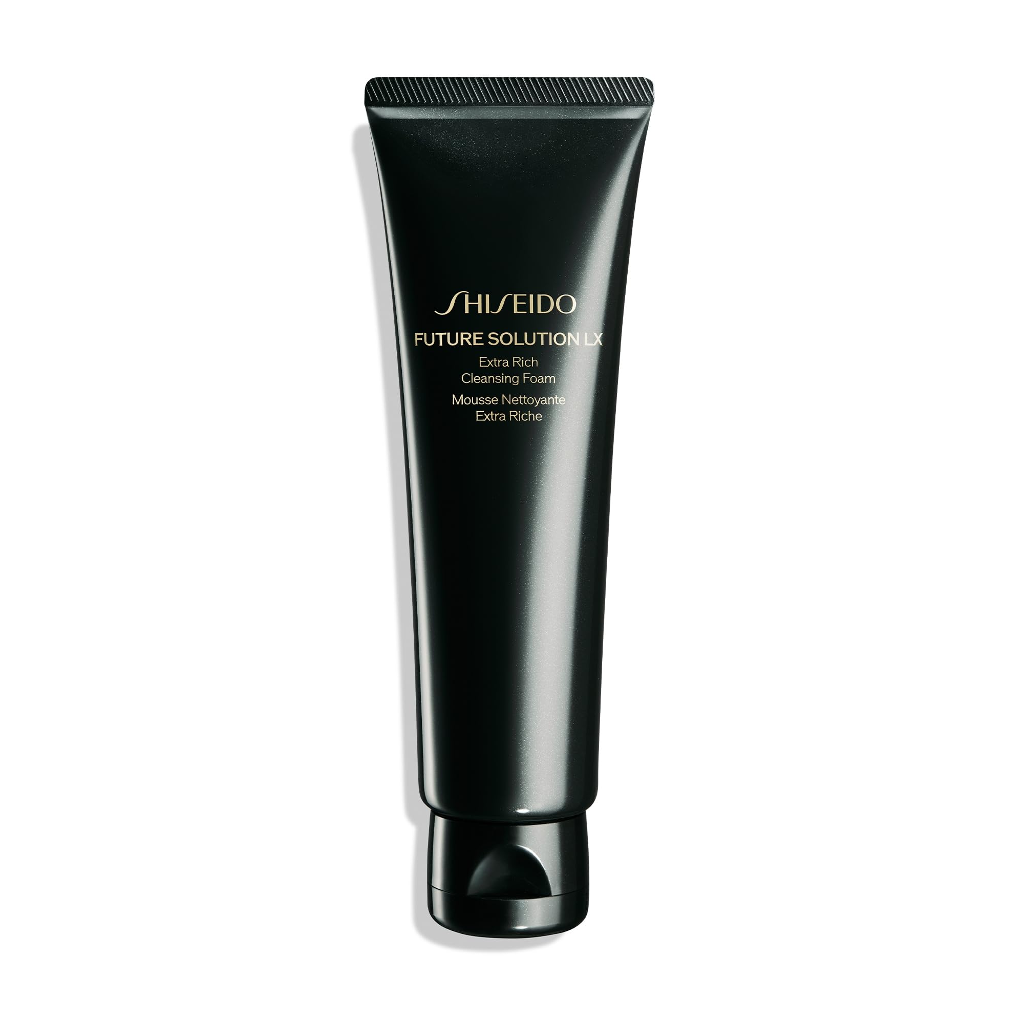 Shiseido Future Solution LX, botella primer plano, limpieza suave para preparar la piel para el cuidado posterior.