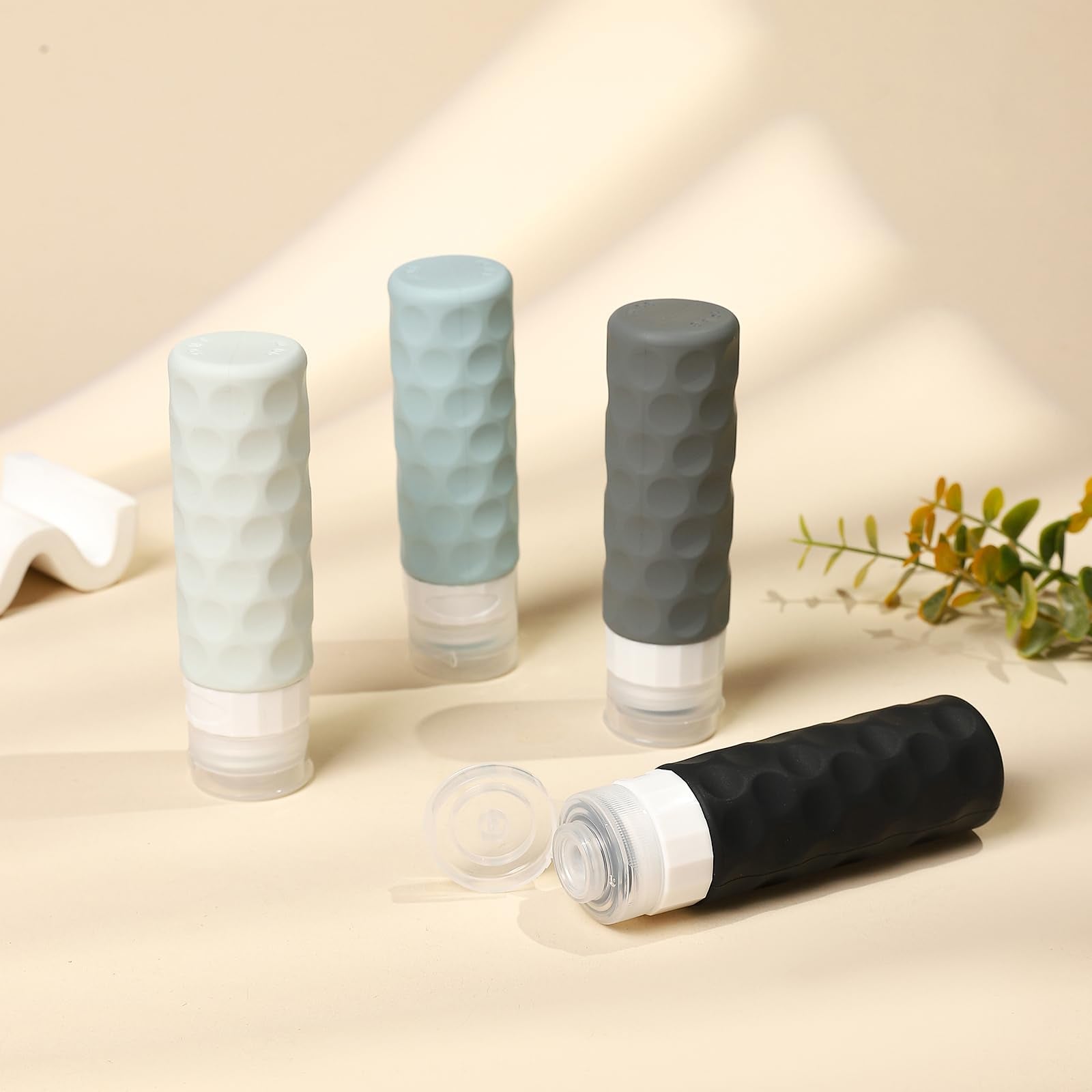 Conjunto de 4 botellas 3oz de Silevoler para higiene personal.