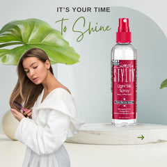 Simply Stylin' brume anti-frise pour une finition lisse.