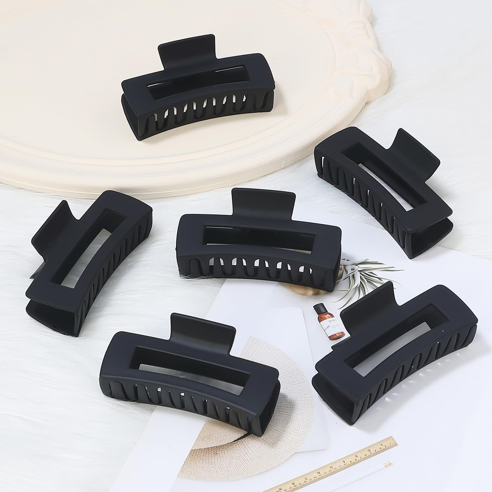 Clip rectangular Sisiaipu negro para uso diario.