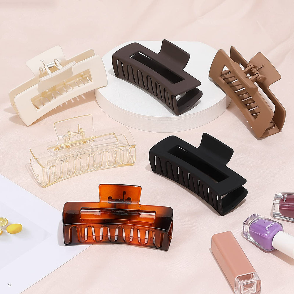 Pinzas Sisiaipu con muelle resistente, agarre firme para cabello grueso.