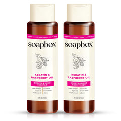 Soapbox Shine champú de keratina en botella, domando frizz y brillo.