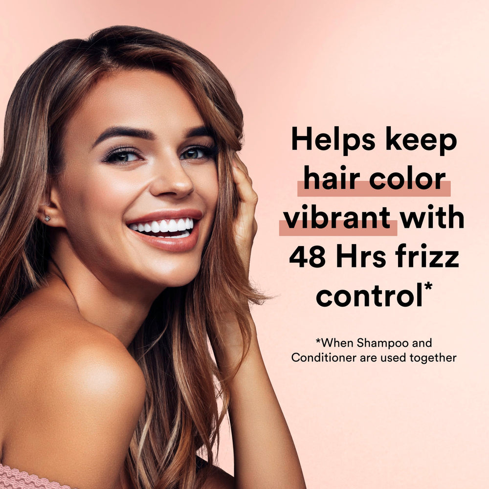 Suave Keratin Infusion conditioner application demonstrates detangling and frizz control.