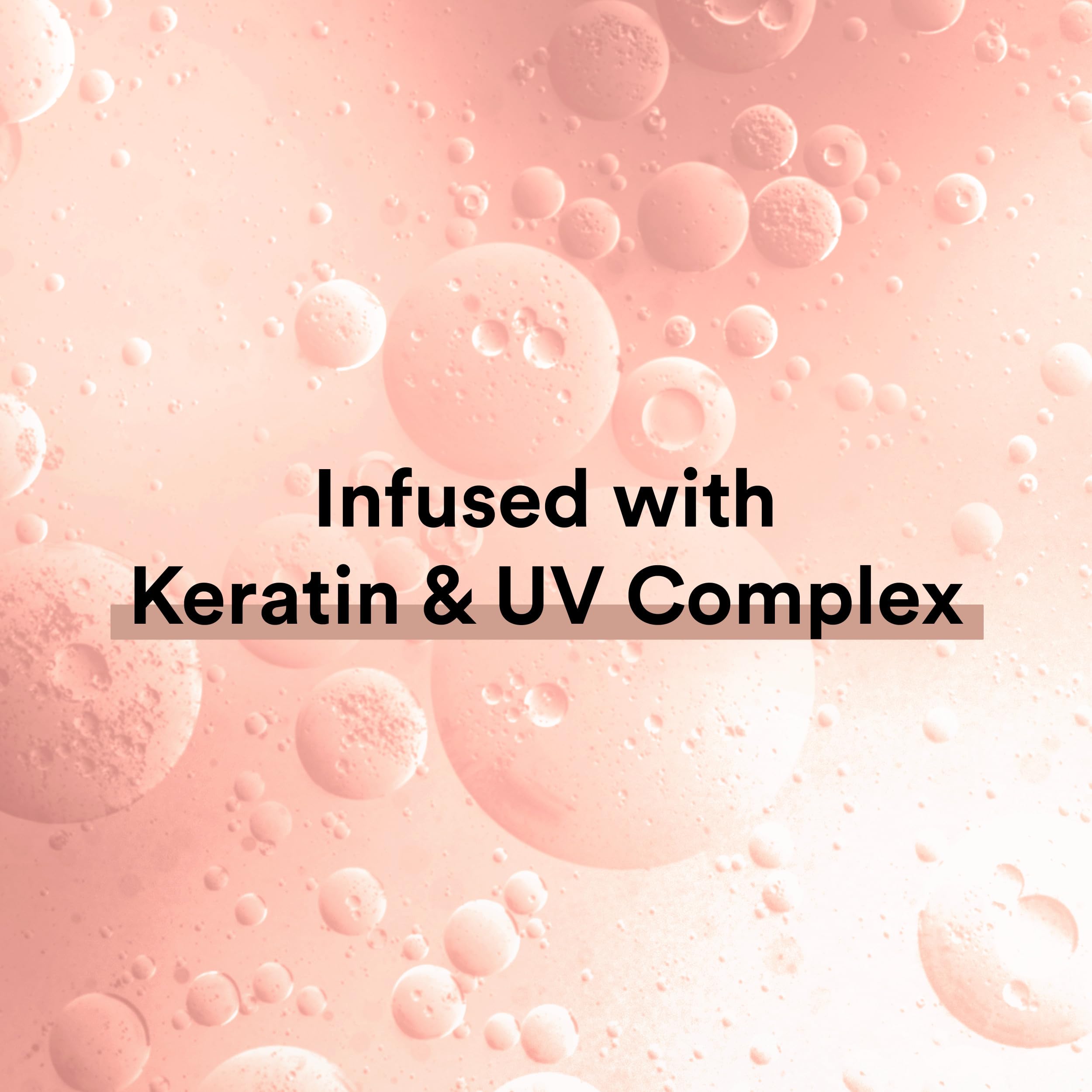 Suave Keratin Infusion frizz-control close-up indicates long-lasting smoothness.