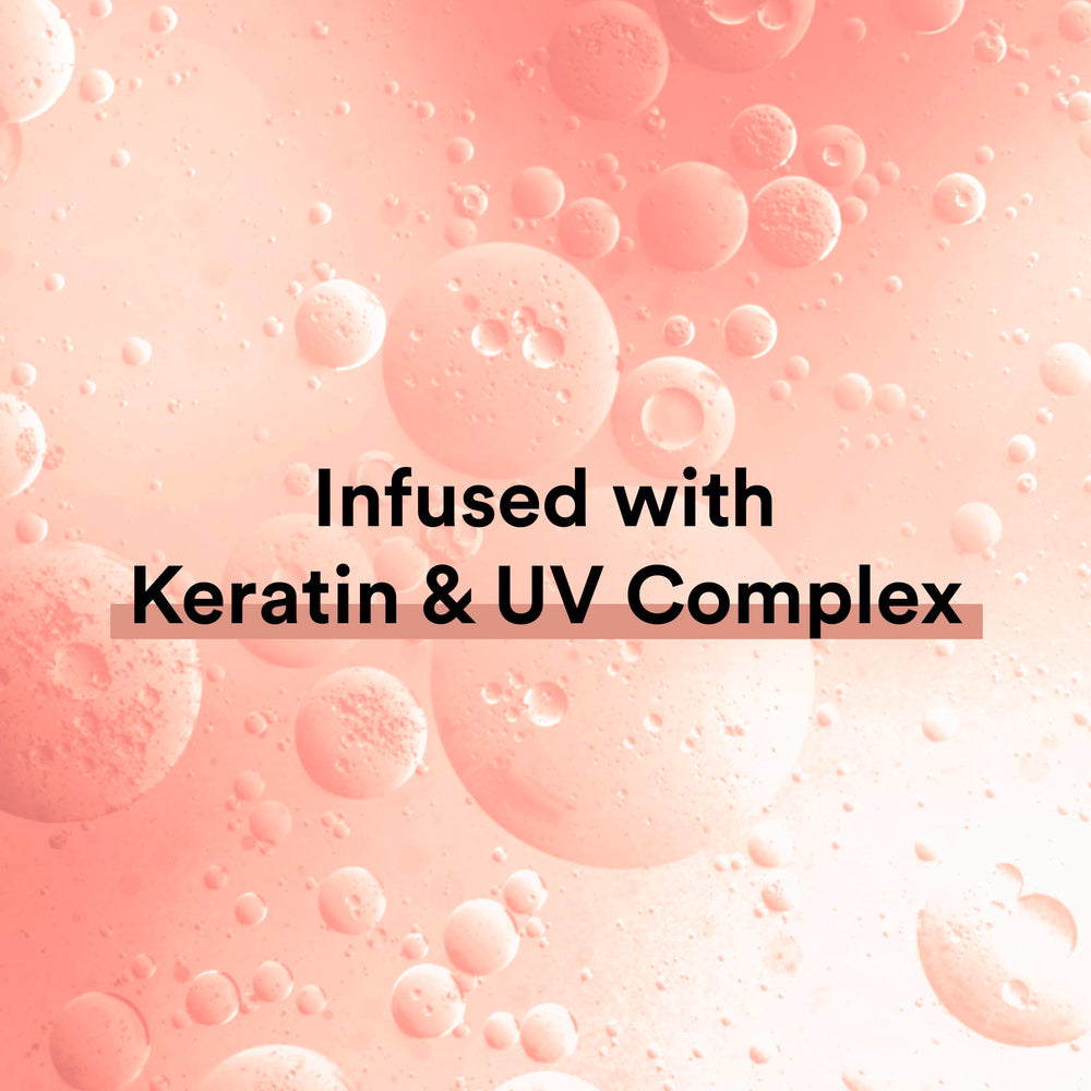 Suave Keratin Infusion frizz-control close-up indicates long-lasting smoothness.